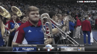 Marching Band Playing In Front Of Kansas Scoreboard GIF