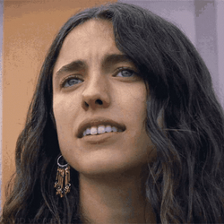 Margaret Qualley Pouting And Making Crying Gesture GIF
