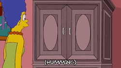 Marge Simpson Opening Cabinet Full Of Book GIF