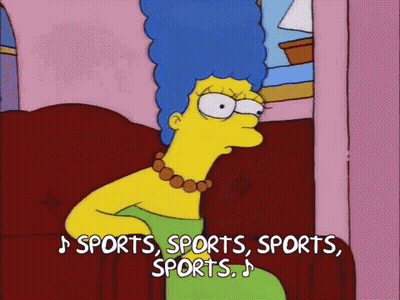 Marge Simpson Sitting On Couch Singing Sports GIF