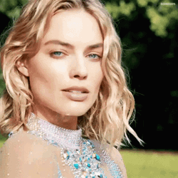 Margot Robbie Intrigued Looking Suspicious GIF