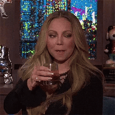 Mariah Carey Holding Glass Of Wine GIF