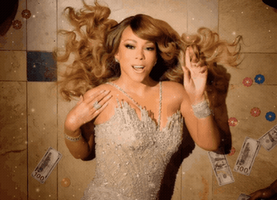 Mariah Carey In Santa Claus Sweater Singing Christmas Song GIF