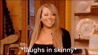 Mariah Carey Laughs On Talk Show GIF