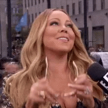 Mariah Carey Putting On Sunglasses GIF