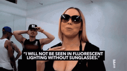 Mariah Wearing Sunglasses In Florescent Lights GIF
