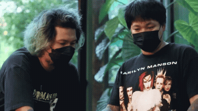 Marilyn Manson Shirt Man Next To Another Man GIF