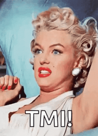 Marilyn Monroe Is Making A Funny Face While Sitting On A Bed . GIF