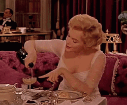 Marilyn Monroe Pouring Champagne