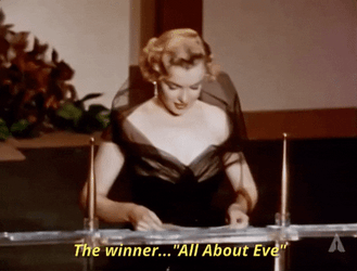 Marilyn Monroe Quotes Presenting Winner GIF