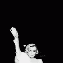 Marilyn Monroe Waving In Front Of The Camera GIF