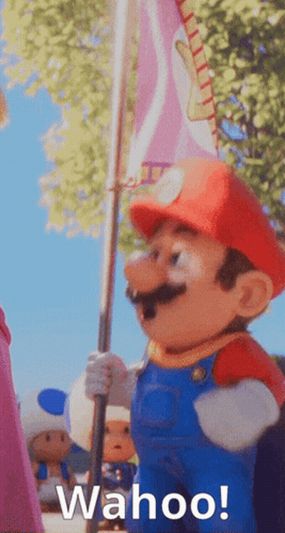 Mario Holding Flag Saying Wahoo GIF
