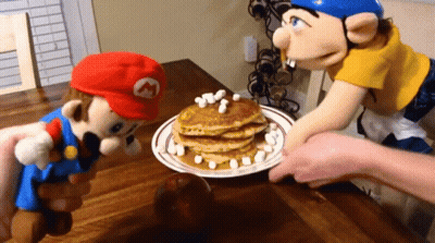 Mario Puppet Reaching For Pancakes GIF