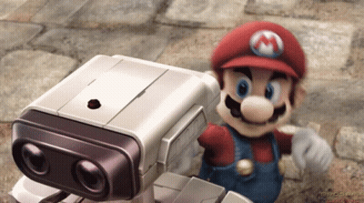 Mario Standing Next To Small Robot GIF