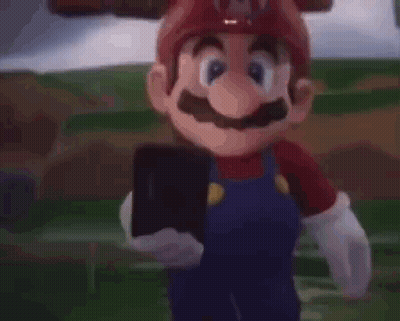 Mario Taking Selfie With Cell Phone GIF