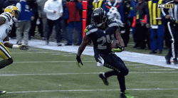 Marshawn Lynch Carrying Ball GIF