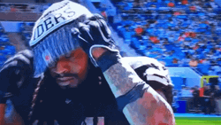 Marshawn Lynch Fixing Bonet GIF