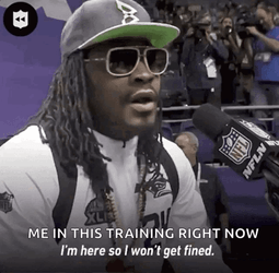 Marshawn Lynch Talks With Microphone GIF