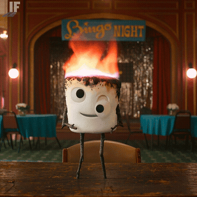 Marshmallow With Flames Standing In Front Of Bingo Night Sign GIF