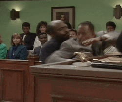 Martin Getting Sat Down By Court Security GIF