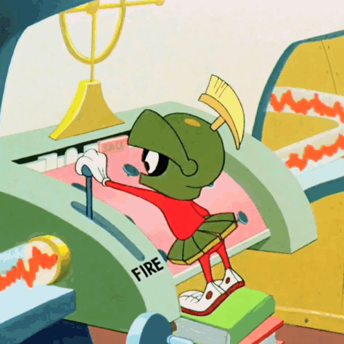 Marvin The Martian Is Pushing A Button That Says Fire On It GIF