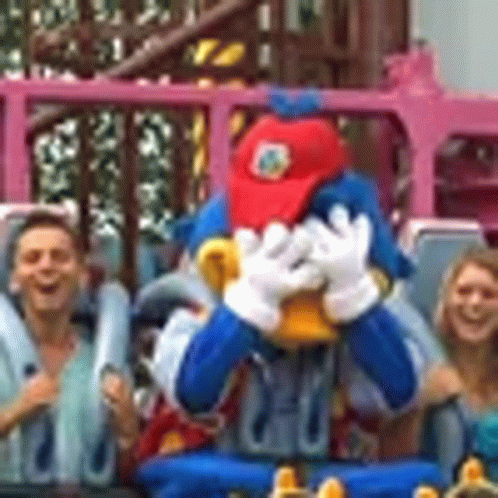 Mascot Covering Face During Roller Coaster Ride GIF