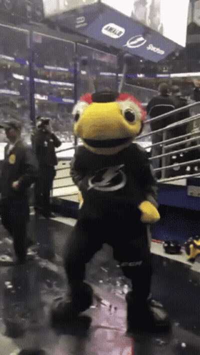 Mascot Dancing In Front Of Intel Sign GIF