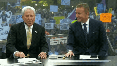 Mascot Dancing In Stadium With Letter S GIF