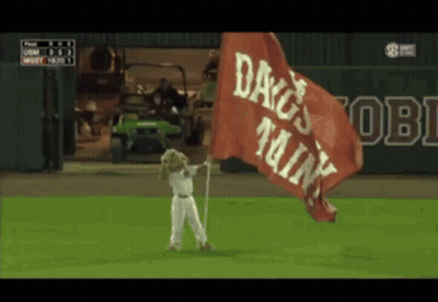 Mascot Holding Flag Saying Dags Min GIF