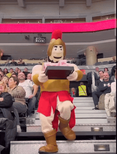 Mascot Holding Popcorn In Front Of Crowd GIF