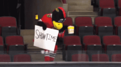 Mascot Holding Showtime Sign GIF