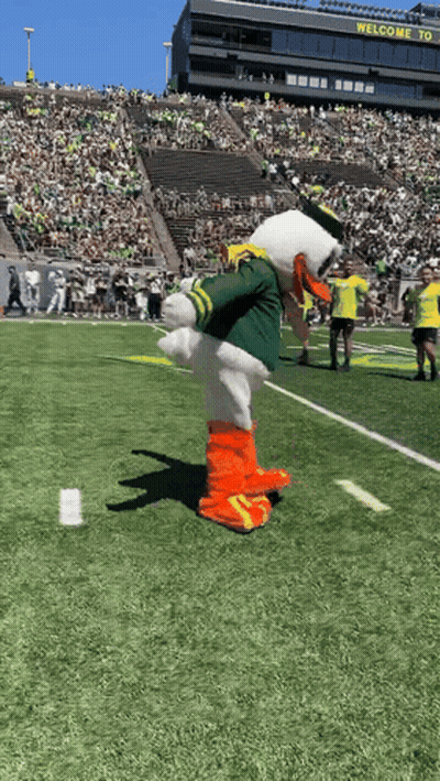 Mascot Holding Welcome Sign GIF