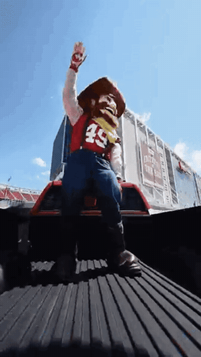 Mascot In Cowboy Costume With Number 49 GIF