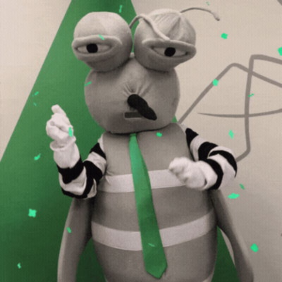 Mascot In Gray And White Striped Outfit And Tie GIF
