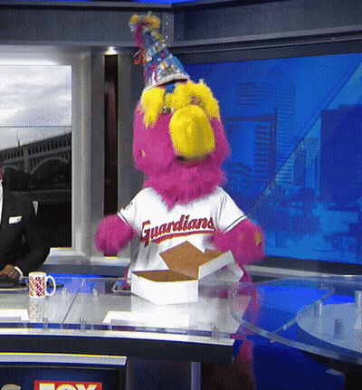 Mascot In Guardians Jersey Holding Food Box GIF