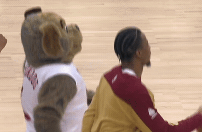 Mascot In Jersey Next To Basketball Player GIF