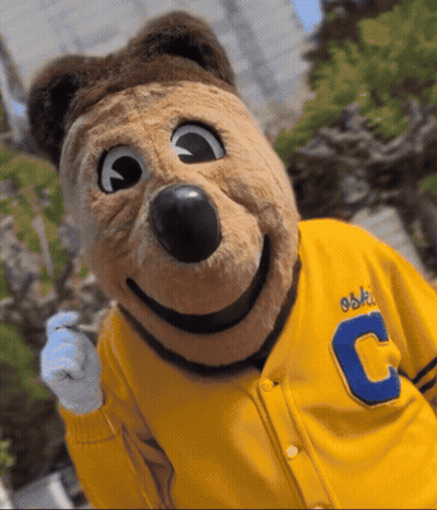 Mascot In Yellow Jacket With Letter C GIF