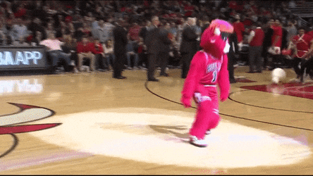 Mascot Performing Salsa In Basketball Court GIF