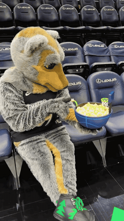 Mascot Sitting In Empty Lexus Seat Holding Popcorn GIF