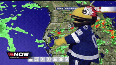 Mascot Standing Before Titan Doppler Map GIF