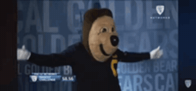 Mascot Standing In Front Of Golden Bear GIF