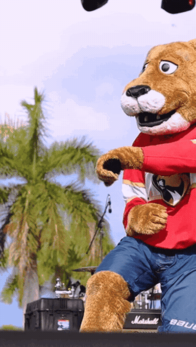 Mascot Standing In Front Of Marshall Amp GIF
