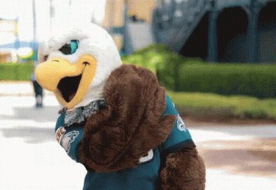 Mascot Wearing Blue Eagle Shirt GIF