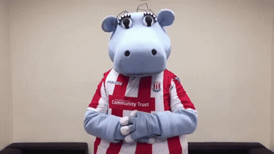 Mascot Wearing Community Trust Shirt GIF