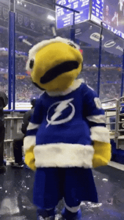 Mascot With Lightning Bolt Shirt On Ice GIF