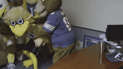 Mascots One Wearing Number 8 Jersey GIF