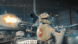Mask Man Firing The Machine Gun GIF