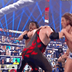 Masked Kane Chokeslam Riddle And Shinsuke Nakamura GIF