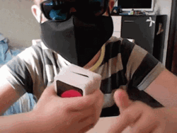 Masked Kid With Blue Uno Reverse Card GIF
