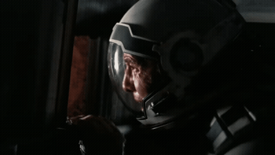 Masked Man In Dark Room GIF